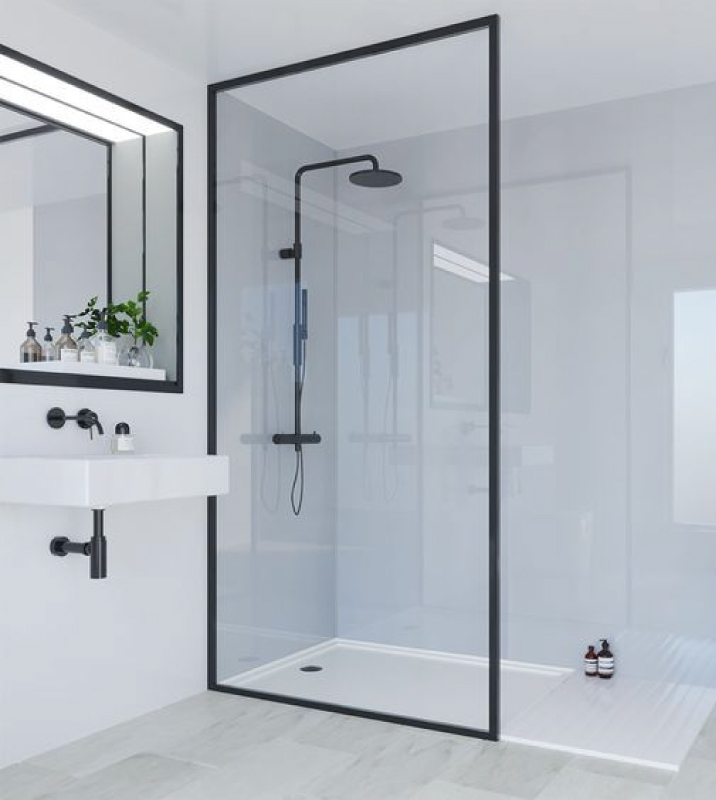 Modern white bathroom with black shower features