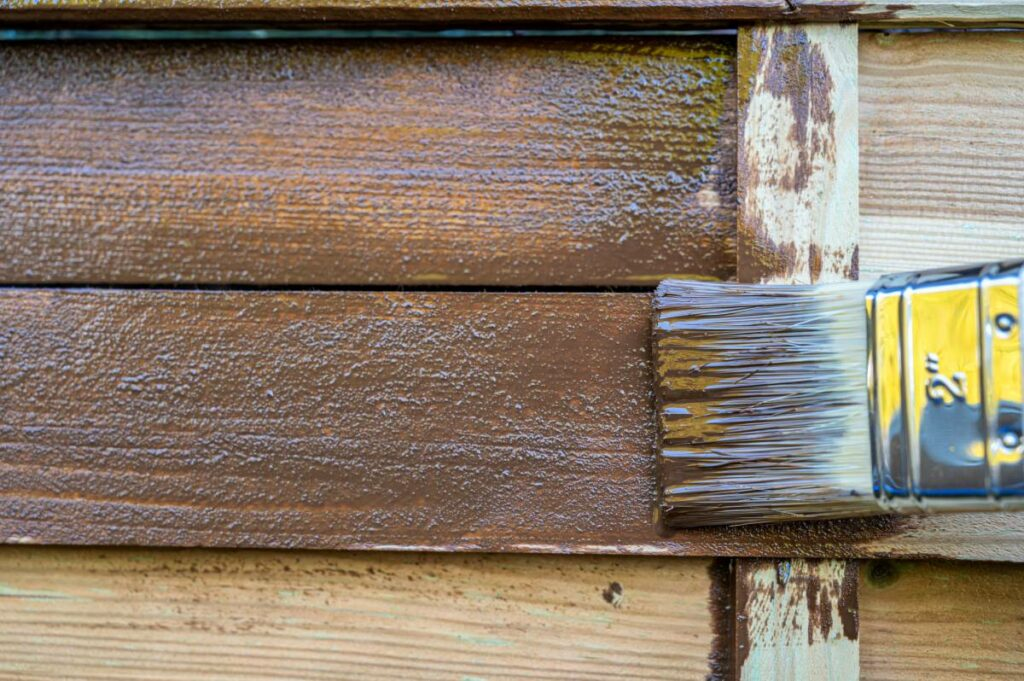 Wooden fence painted to look more worn out