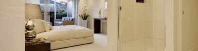 A modern bedroom with an ensuite