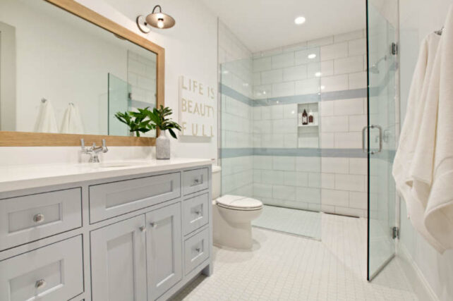Shower Hob vs Hobless Shower - Modern bathroom interior with a tiled hobless shower