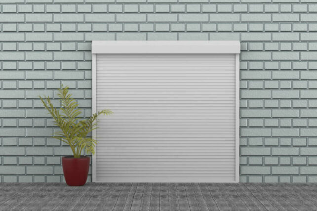 How to fix garage roller door - Clean and smoothly operating white garage roller door